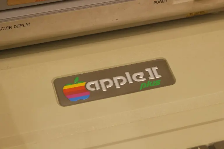 A close up of a microwave with a sticker on it